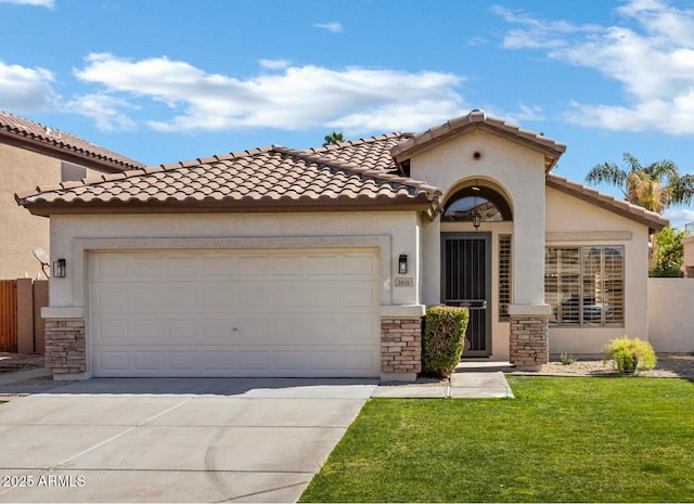 mediterranean / spanish-style house with a garage, stone siding, driveway, and stucco siding