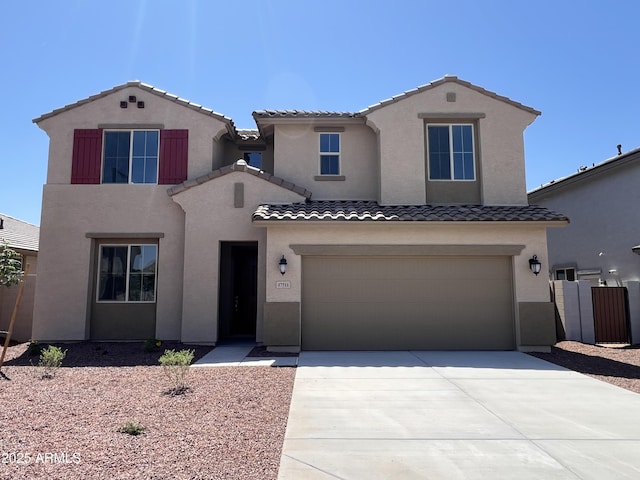 17511 W Fulton St, Goodyear, AZ 85338 - view of front of home with a tile roof, stucco siding, a garage, and driveway