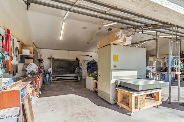 garage with a workshop area