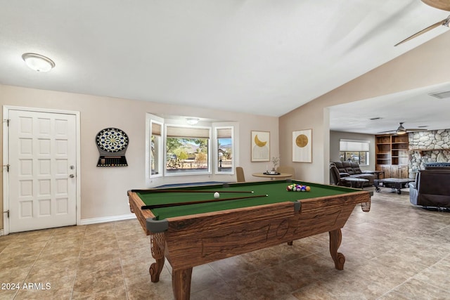 rec room featuring ceiling fan, billiards, tile patterned floors, lofted ceiling, and a fireplace