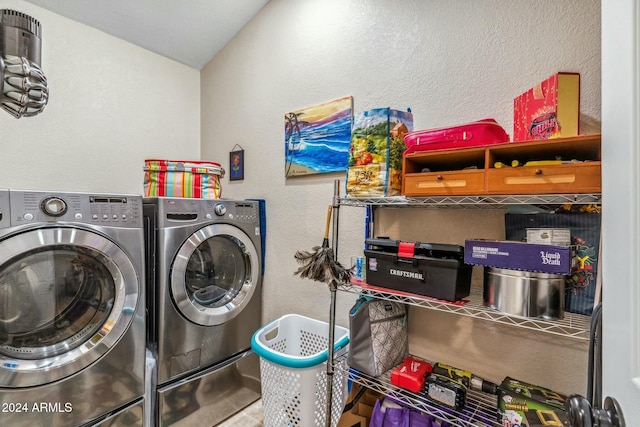 washroom featuring washing machine and dryer