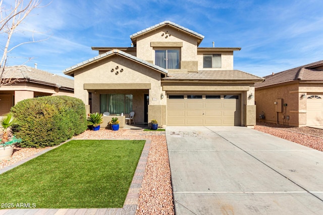 view of front of property with a front yard and a garage