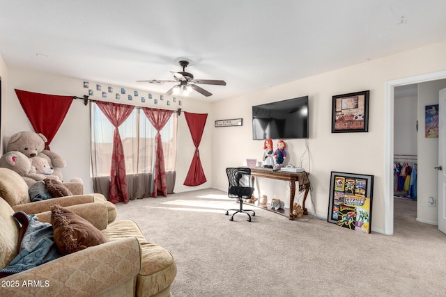 carpeted office with ceiling fan