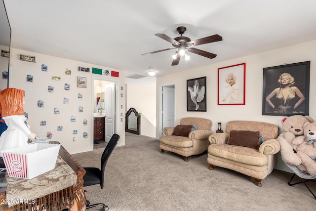 home office with light carpet and ceiling fan