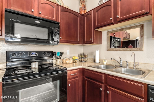 kitchen with sink and black appliances