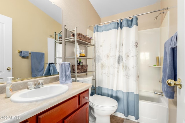 full bathroom featuring vanity, shower / tub combo with curtain, and toilet