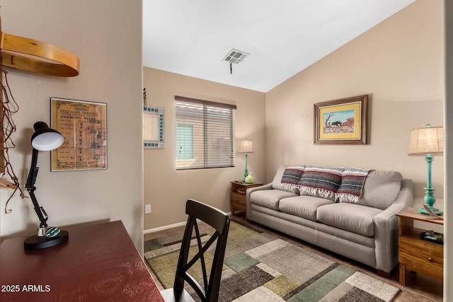 living room with lofted ceiling