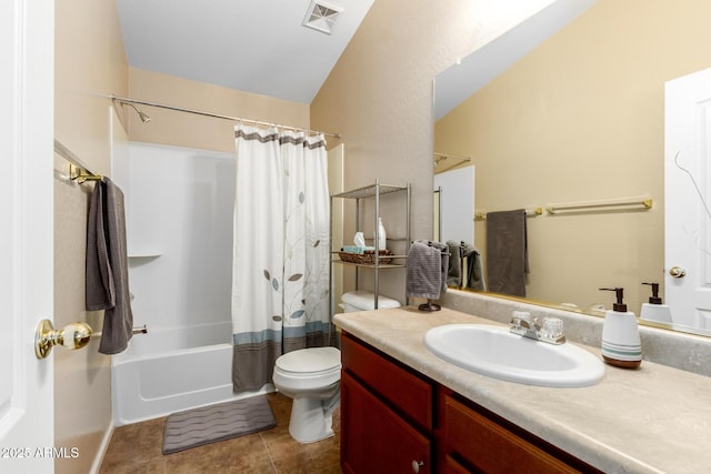 full bathroom with shower / tub combo, vanity, tile patterned floors, and toilet