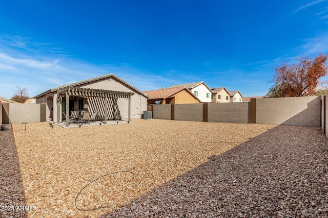 view of yard with a pergola and a patio