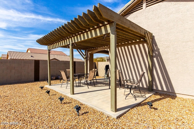 view of patio / terrace featuring a pergola