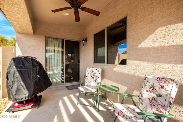 view of patio / terrace featuring a grill and ceiling fan