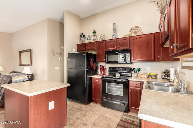 kitchen with tasteful backsplash, sink, and black appliances