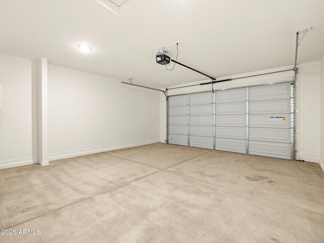 3550 N Camden Dr, Florence, AZ 85132 - garage featuring a garage door opener and baseboards