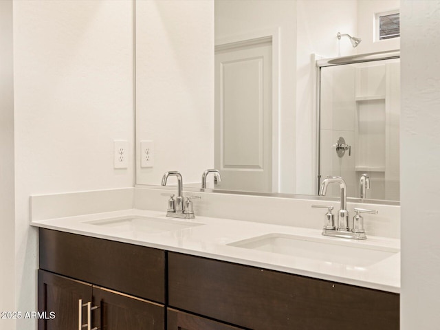 3550 N Camden Dr, Florence, AZ 85132 - full bathroom with double vanity and a shower with shower door