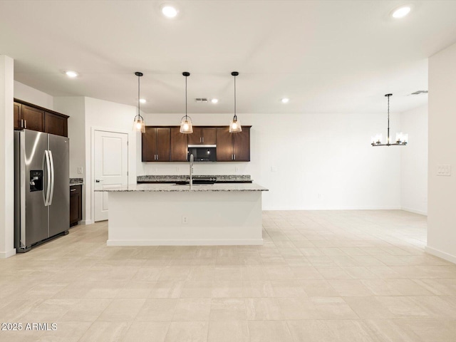 3550 N Camden Dr, Florence, AZ 85132 - kitchen with appliances with stainless steel finishes, recessed lighting, dark brown cabinets, a chandelier, and an island with sink