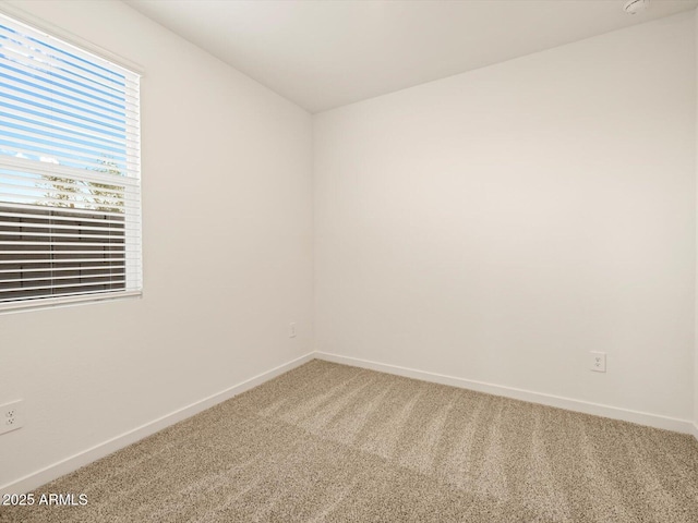 3550 N Camden Dr, Florence, AZ 85132 - empty room featuring light carpet and baseboards