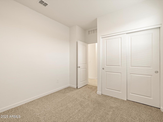 3550 N Camden Dr, Florence, AZ 85132 - unfurnished bedroom with light carpet and a closet