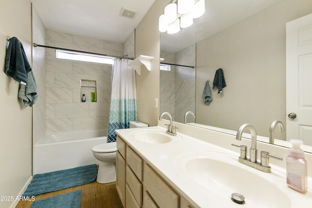 1072 W Windhaven Ave, Gilbert, AZ 85233 - full bath featuring toilet, shower / tub combo with curtain, double vanity, and wood finished floors