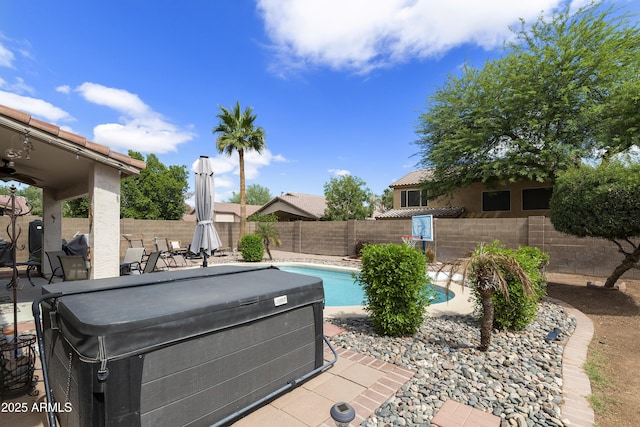 1072 W Windhaven Ave, Gilbert, AZ 85233 - fenced backyard featuring a hot tub and a patio area
