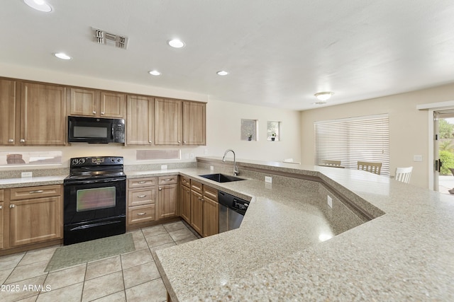 1072 W Windhaven Ave, Gilbert, AZ 85233 - kitchen with black appliances, a sink, light tile patterned flooring, recessed lighting, and a peninsula
