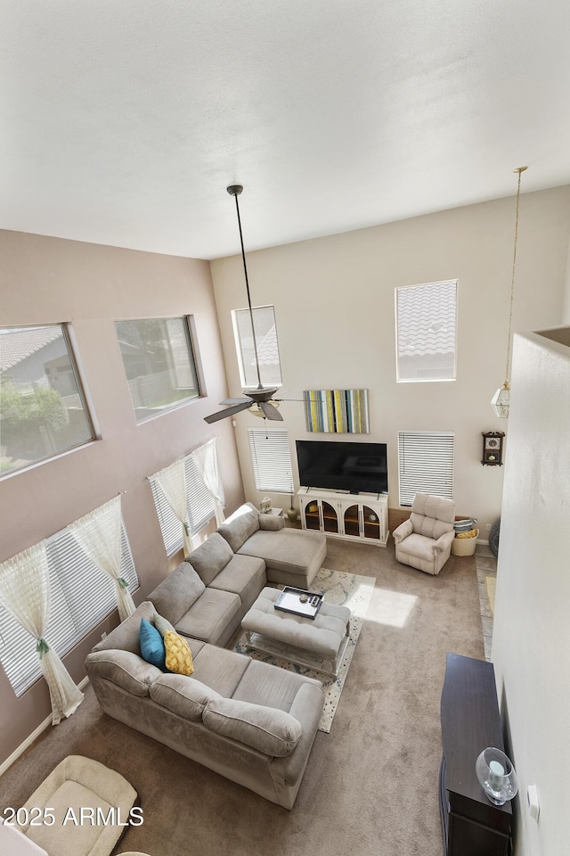 1072 W Windhaven Ave, Gilbert, AZ 85233 - carpeted living room with a ceiling fan