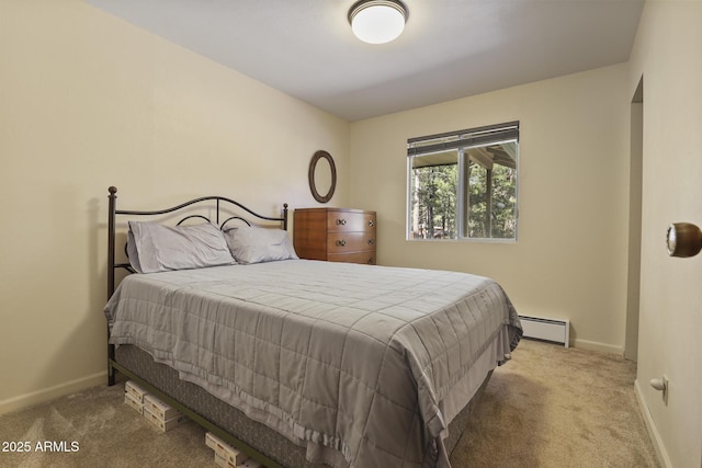 3017 Larson Loop, Forest Lakes, AZ 85931 - carpeted bedroom with a baseboard heating unit and baseboards