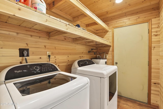 3017 Larson Loop, Forest Lakes, AZ 85931 - clothes washing area featuring washer and clothes dryer, electric water heater, wood finished floors, wood walls, and wooden ceiling
