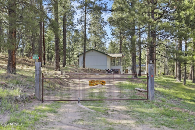 3017 Larson Loop, Forest Lakes, AZ 85931 - view of front of home with a gate and fence
