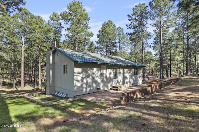 3017 Larson Loop, Forest Lakes, AZ 85931 - view of side of home with crawl space and metal roof
