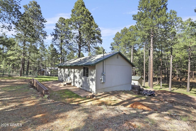 3017 Larson Loop, Forest Lakes, AZ 85931 - view of property exterior with an outbuilding and fence