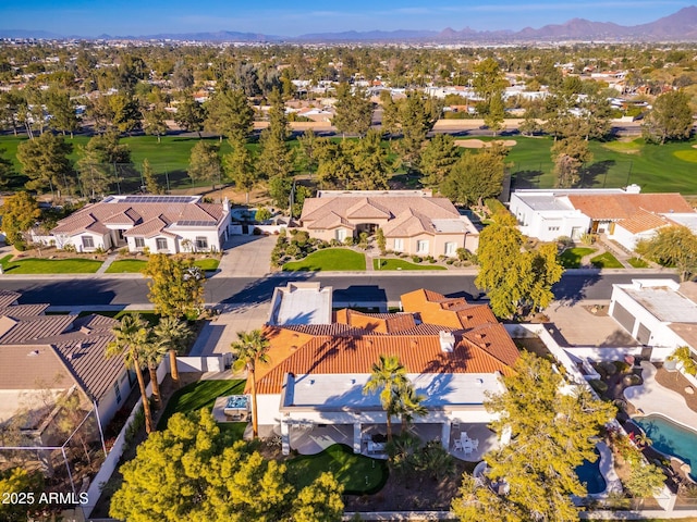 birds eye view of property featuring a mountain view