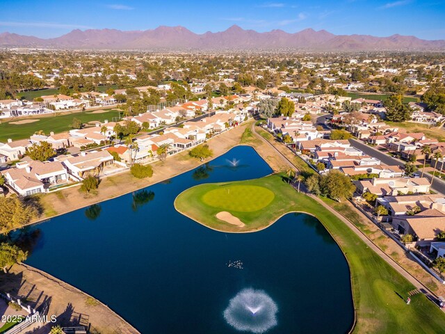 aerial view with a water and mountain view