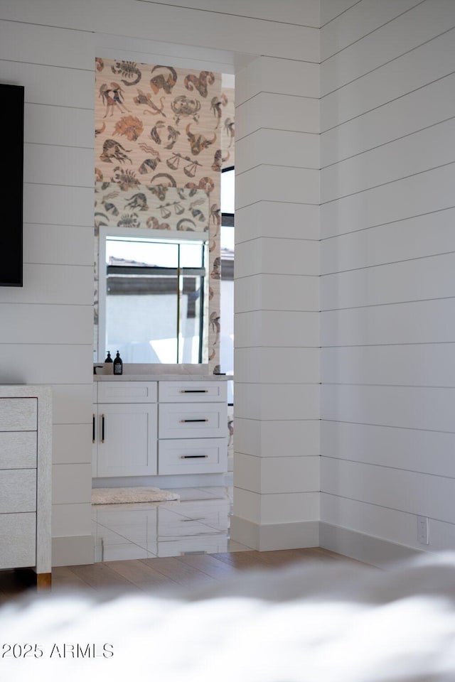 bathroom with wooden walls