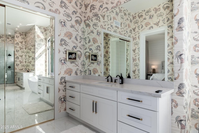 bathroom with a bathing tub and vanity