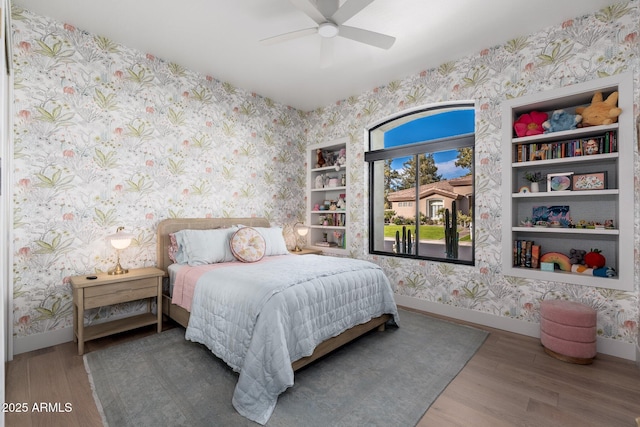 bedroom featuring wood-type flooring and ceiling fan