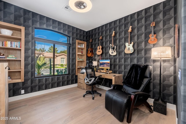 office with wood-type flooring