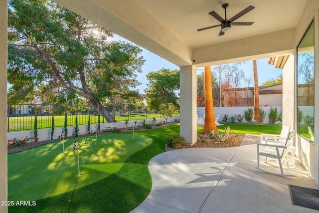 view of patio / terrace featuring ceiling fan