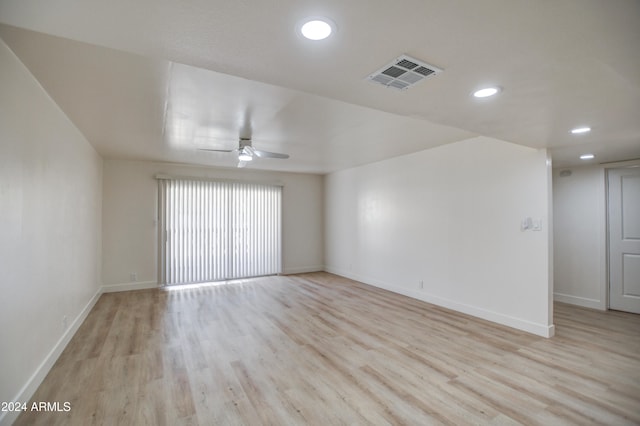 unfurnished room featuring ceiling fan and light wood-type flooring