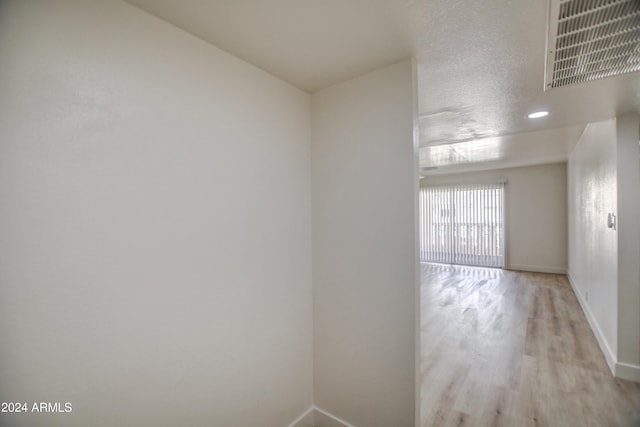 empty room featuring light hardwood / wood-style floors