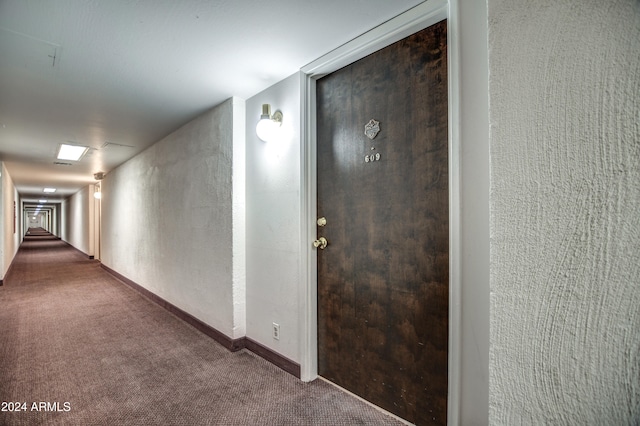 hall featuring carpet floors