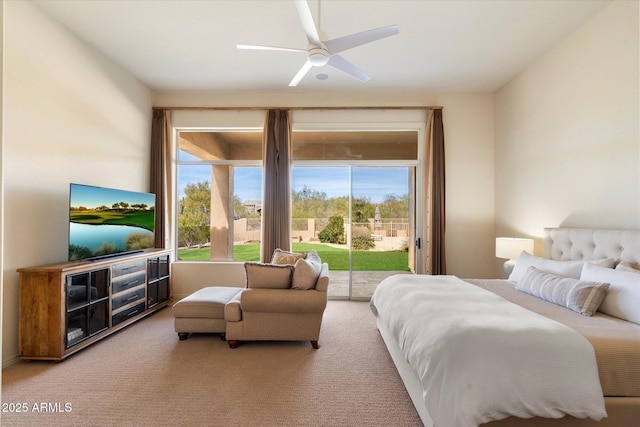 carpeted bedroom featuring ceiling fan and access to exterior