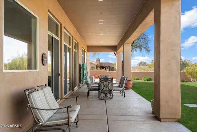 view of patio / terrace featuring outdoor dining space and a fenced backyard