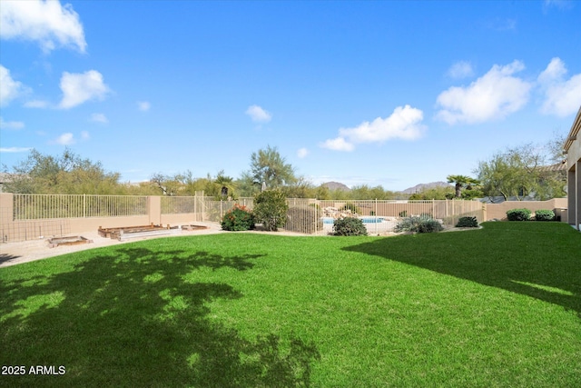 view of yard with a fenced backyard and a fenced in pool