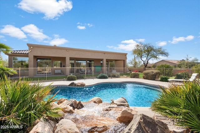 view of pool featuring a fenced in pool and fence