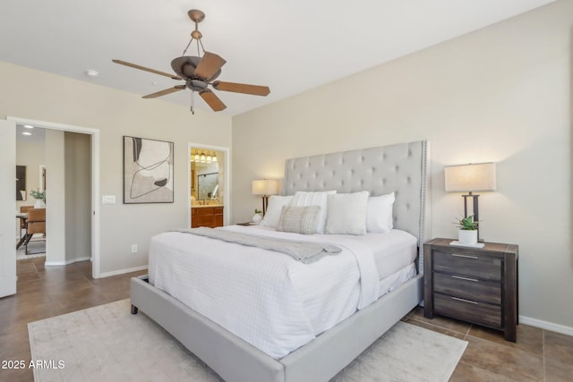 bedroom with ensuite bathroom and ceiling fan