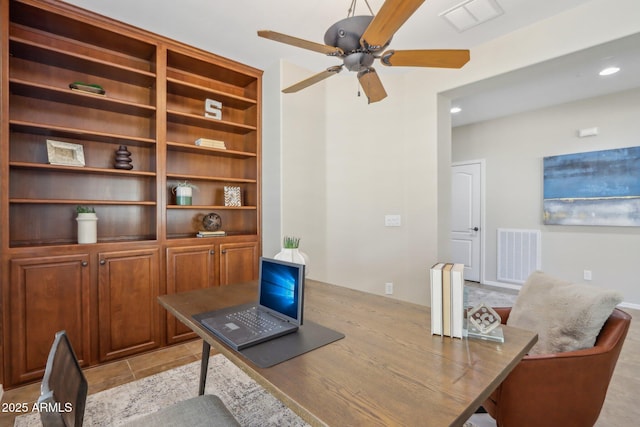 office space with ceiling fan