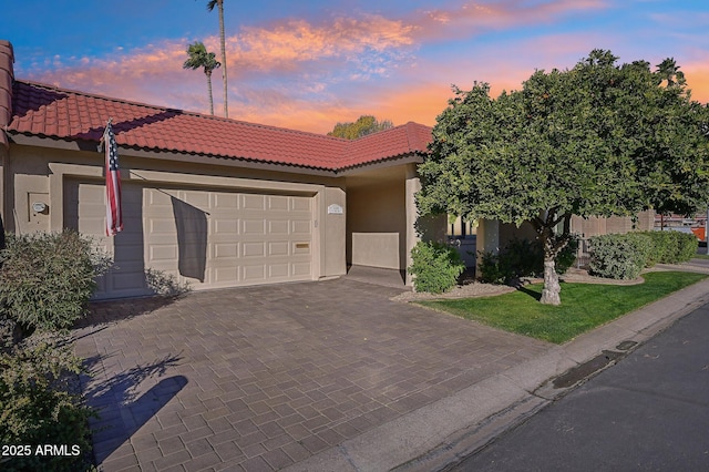 view of front of home featuring a garage