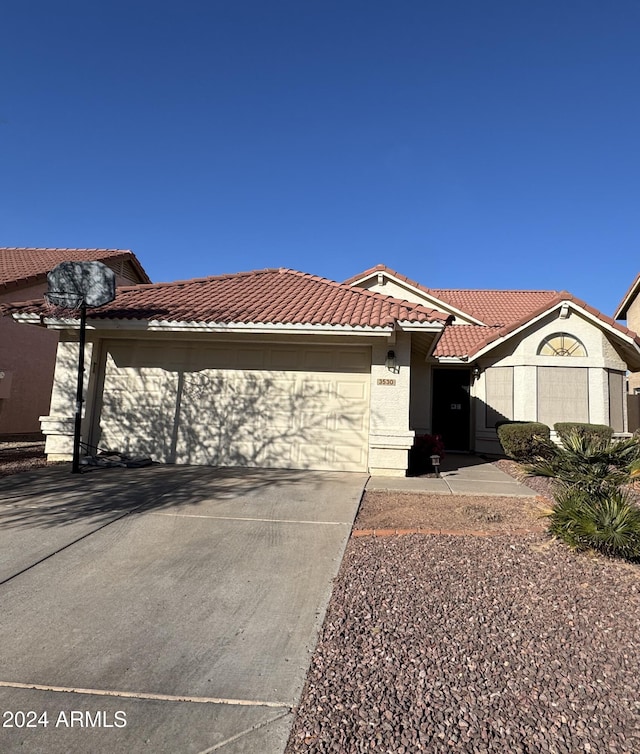 view of front of property with a garage