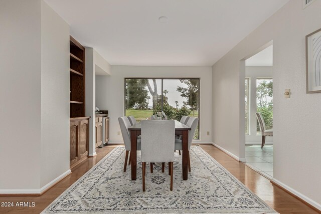 dining room with light wood-type flooring