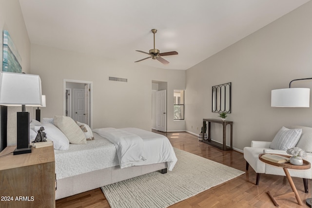 bedroom with hardwood / wood-style floors and ceiling fan